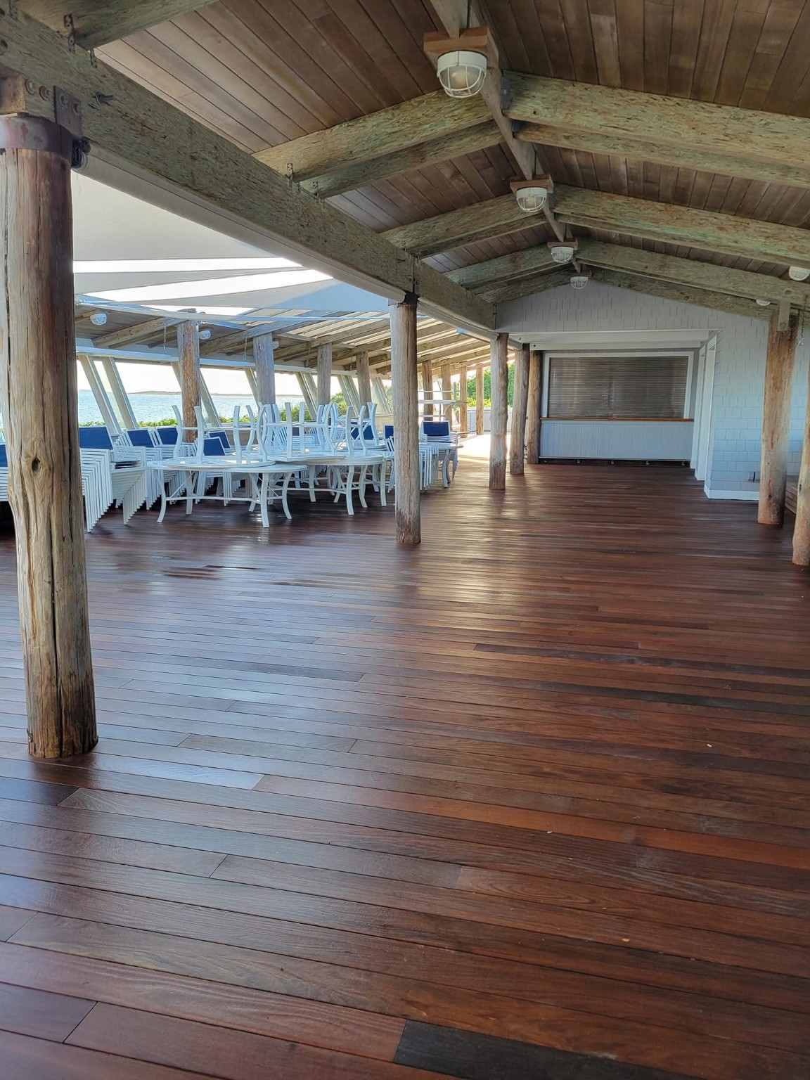 Covered wood deck after cleaning